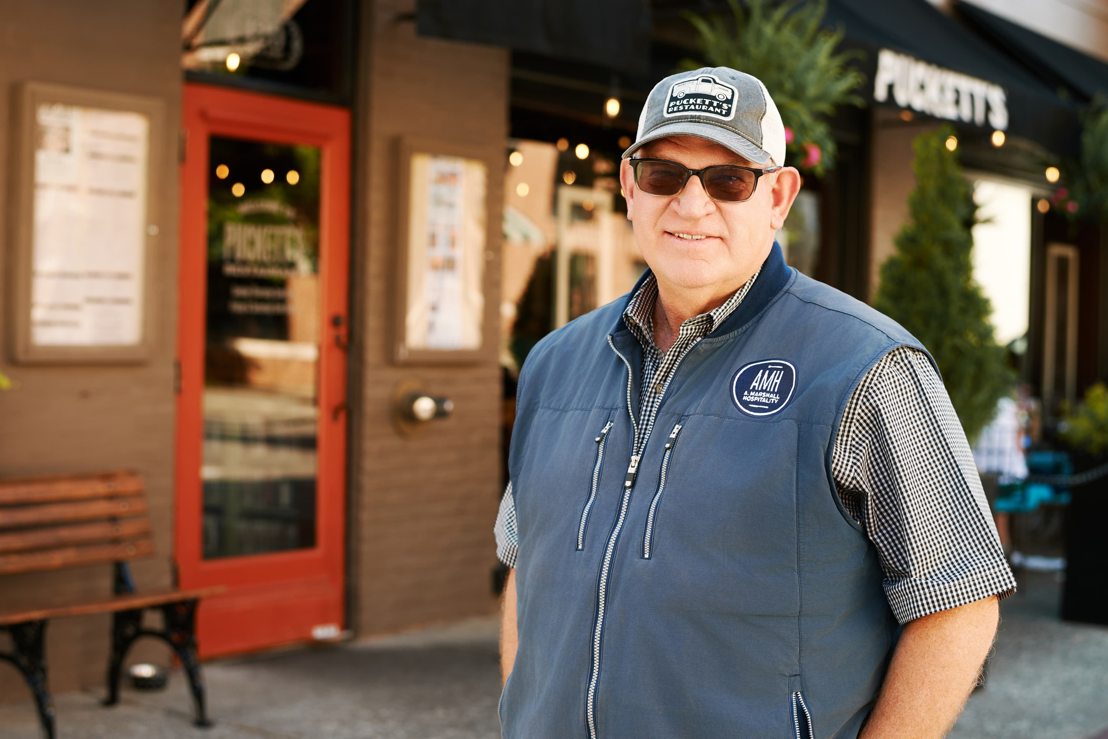 Andy Marshall in front of Puckett's Grocery in Franklin